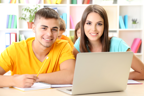 two students with computer shutterstock_145895360